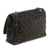 chanel maxi shoulder flap black used back