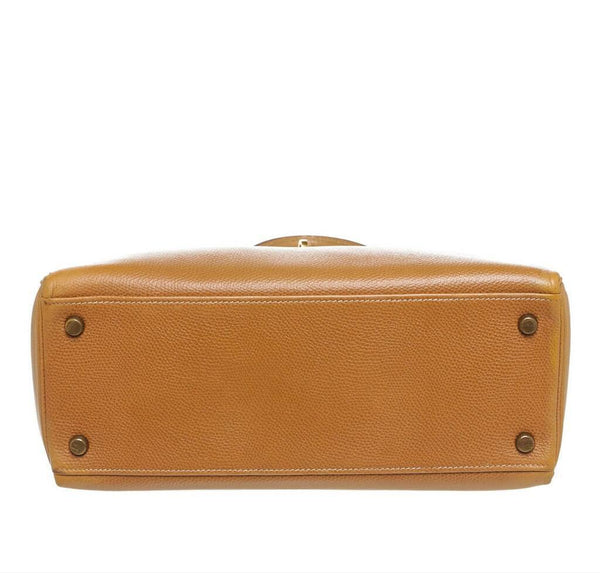 hermes kelly 28 gold used bottom