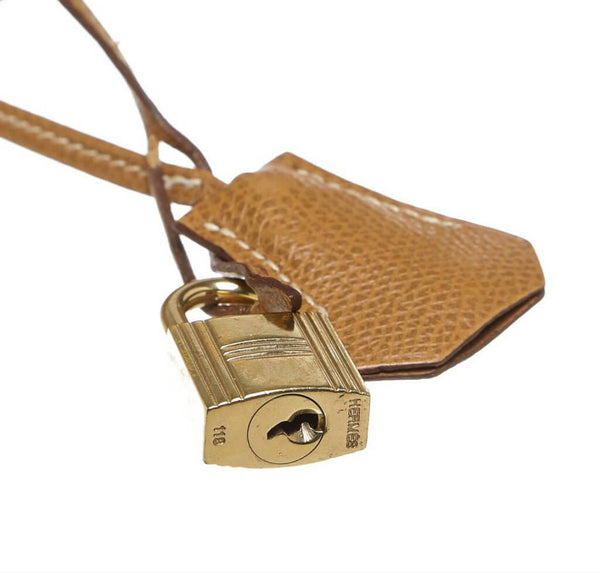 hermes kelly 28 gold used lock