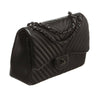 chanel jumbo classic flap bag black used side