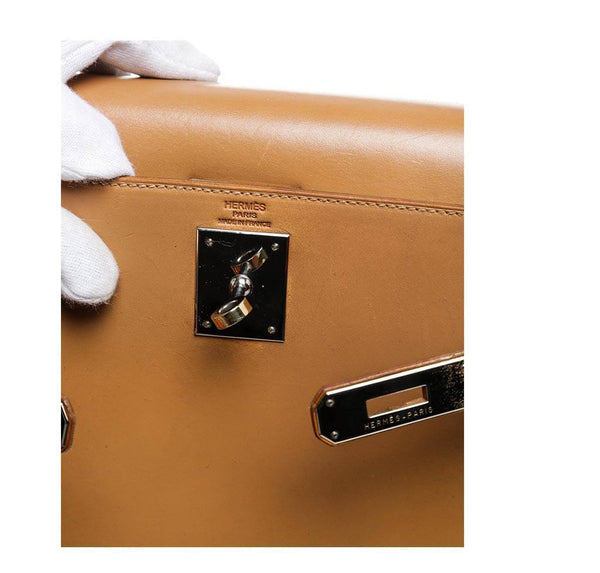 hermes kelly 32 gold used embossing