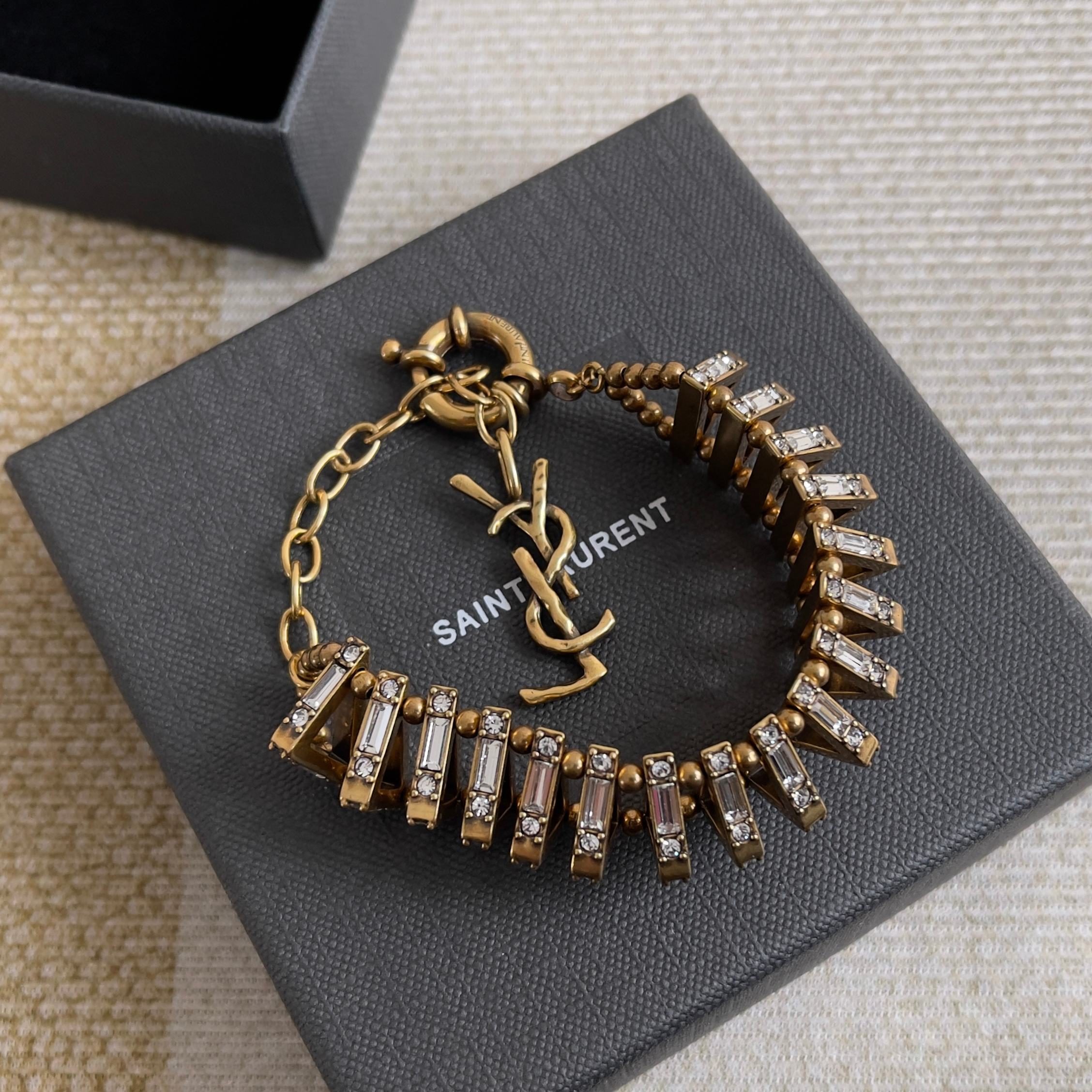 Saint-Laurent-Crystal-Pyramid-Gold-Metal-Bracelets